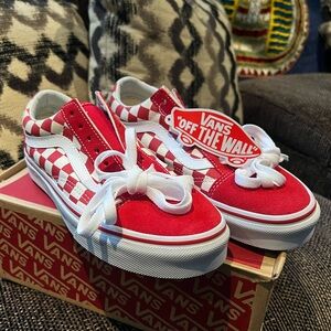 Checkered red and white Vans old skool